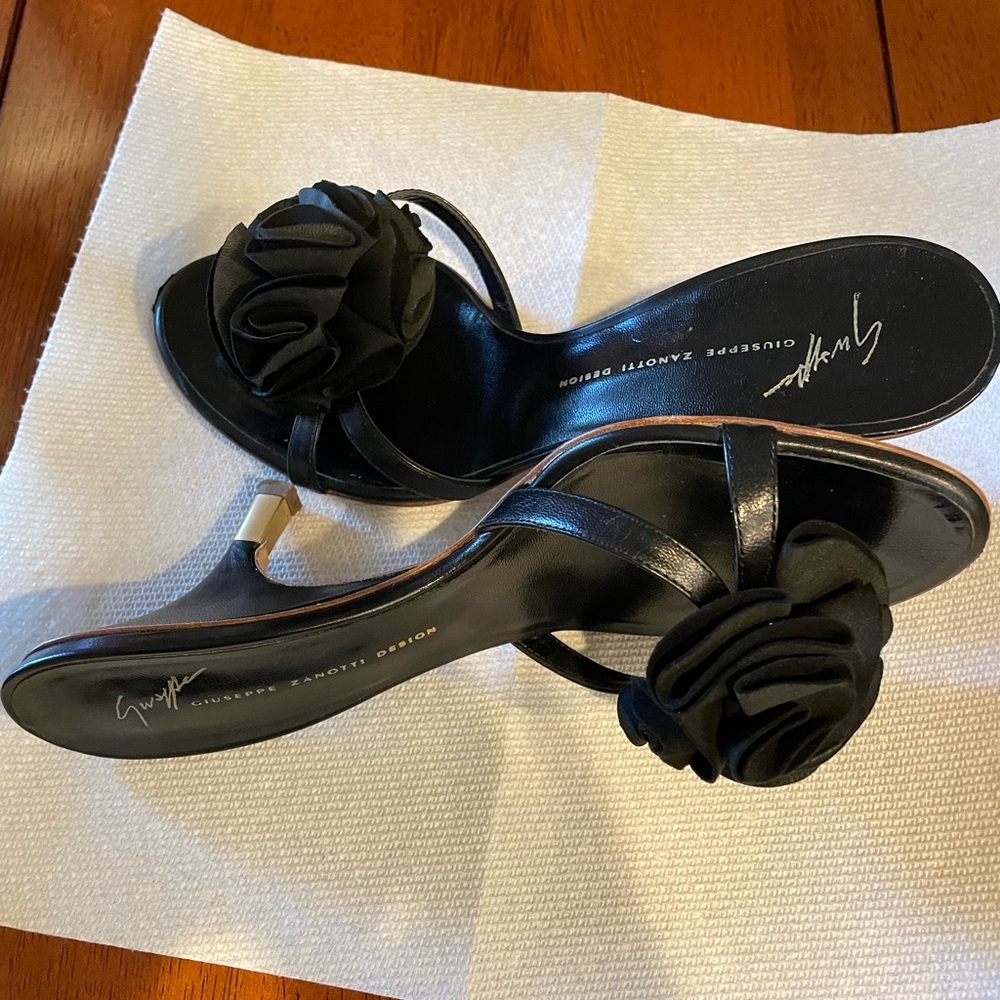 Worn.  Giuseppe Zanotti heels.  Gold low heel. Some wear.